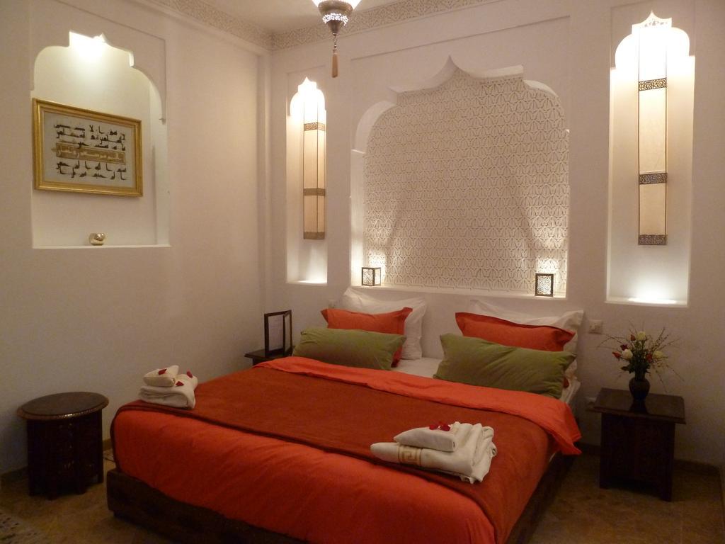 فندق رياض فيفا مراكش المظهر الخارجي الصورة A bedroom in a hotel in Morocco
