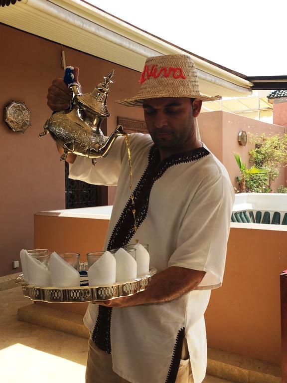 فندق رياض فيفا مراكش المظهر الخارجي الصورة Moroccan coffee being served