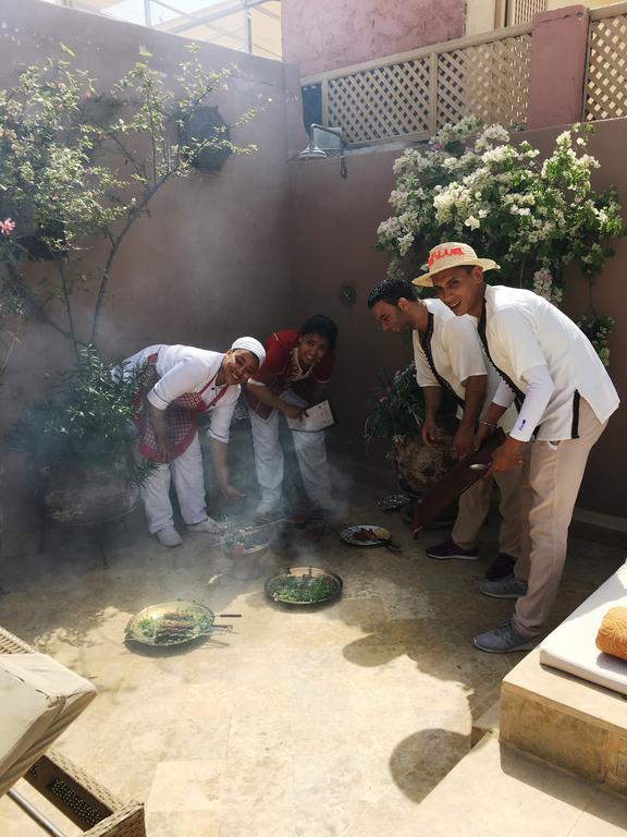 فندق رياض فيفا مراكش المظهر الخارجي الصورة A ritual of the Ifa divination system